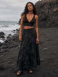 Ethereal smoke print tiered maxi skirt, back view on model outdoors