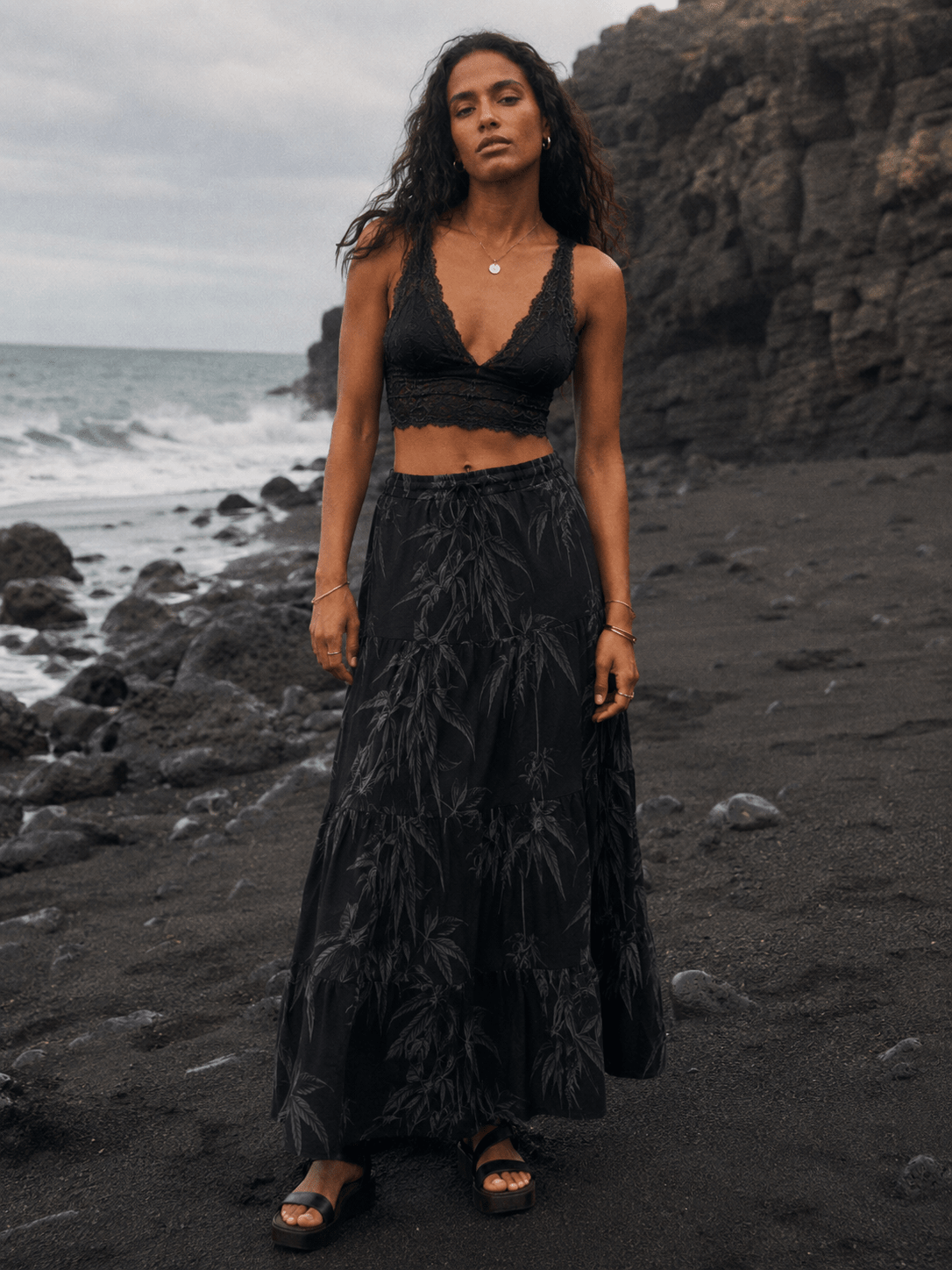 Ethereal smoke print tiered maxi skirt, back view on model outdoors