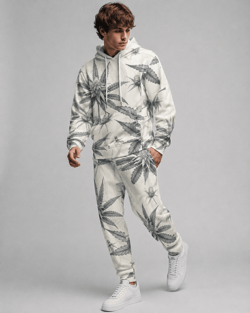 Green leaf print hoodie and sweatpants set, full length view on model outdoors