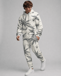 Green leaf print hoodie and sweatpants set, full length view on model outdoors