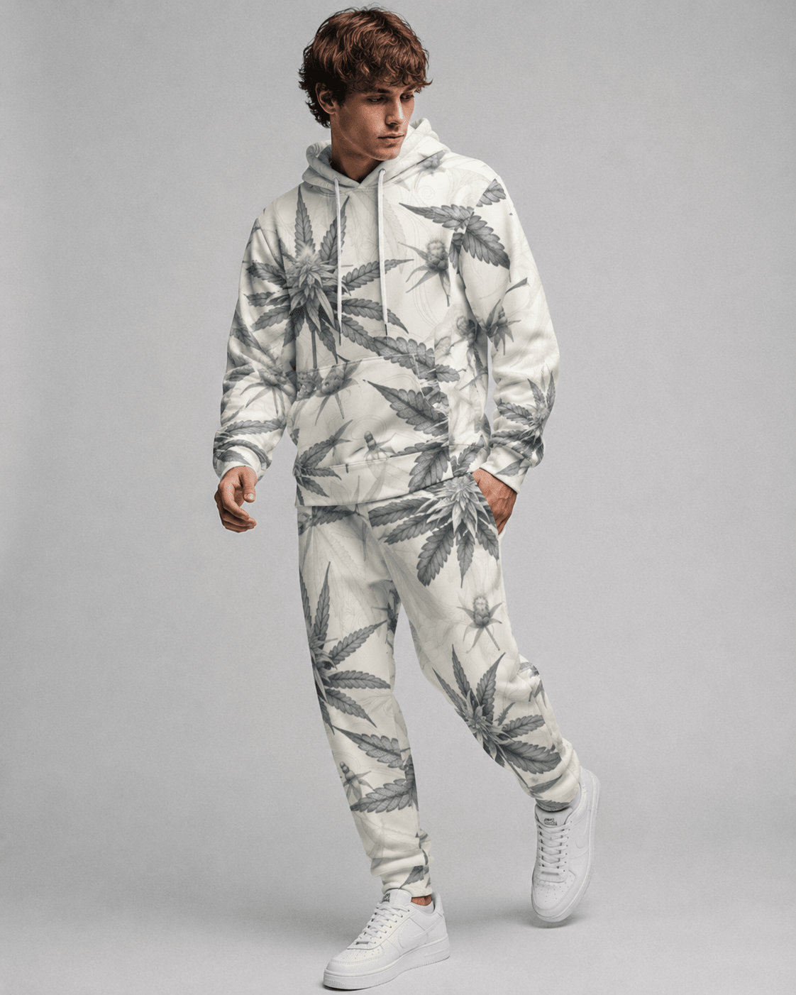 Green leaf print hoodie and sweatpants set, full length view on model outdoors
