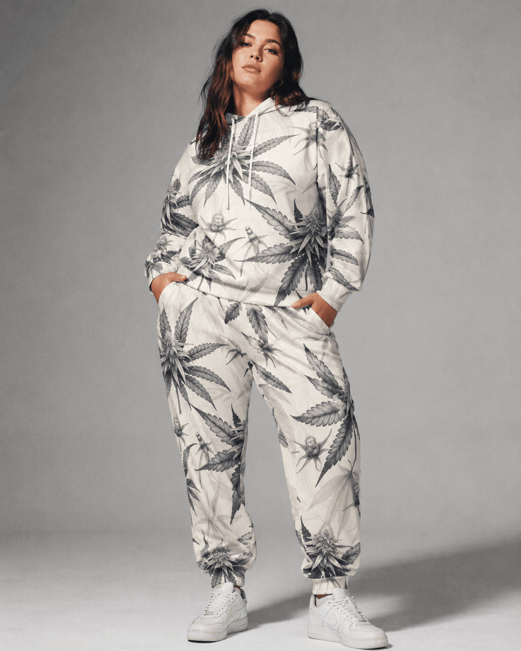 Green leaf print hoodie and sweatpants set, walking shot on model
