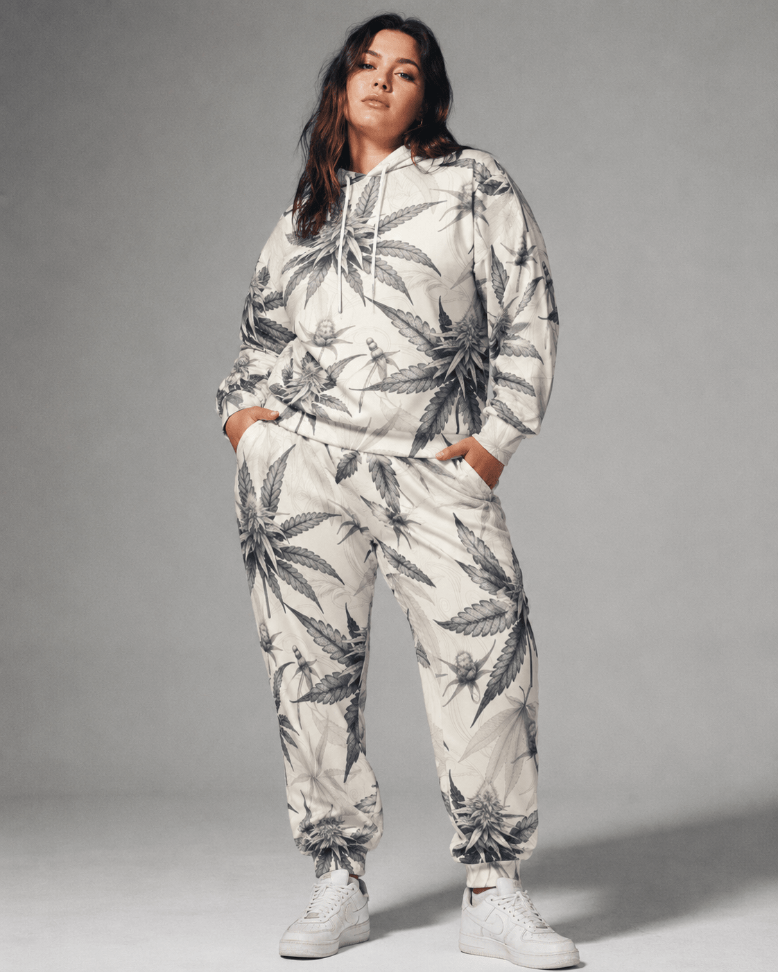 Green leaf print hoodie and sweatpants set, walking shot on model