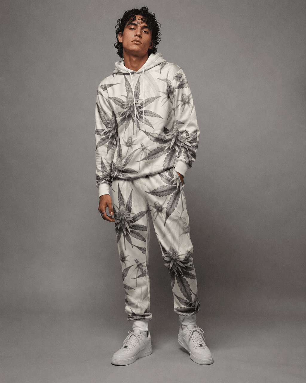 Green leaf print hoodie and sweatpants set, three-quarter view on model