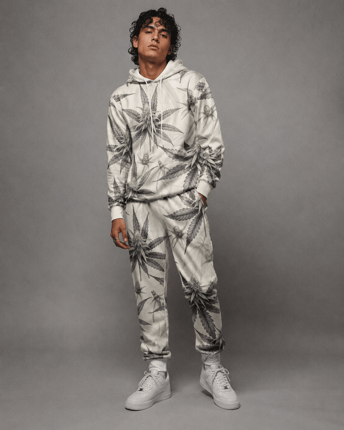 Green leaf print hoodie and sweatpants set, three-quarter view on model