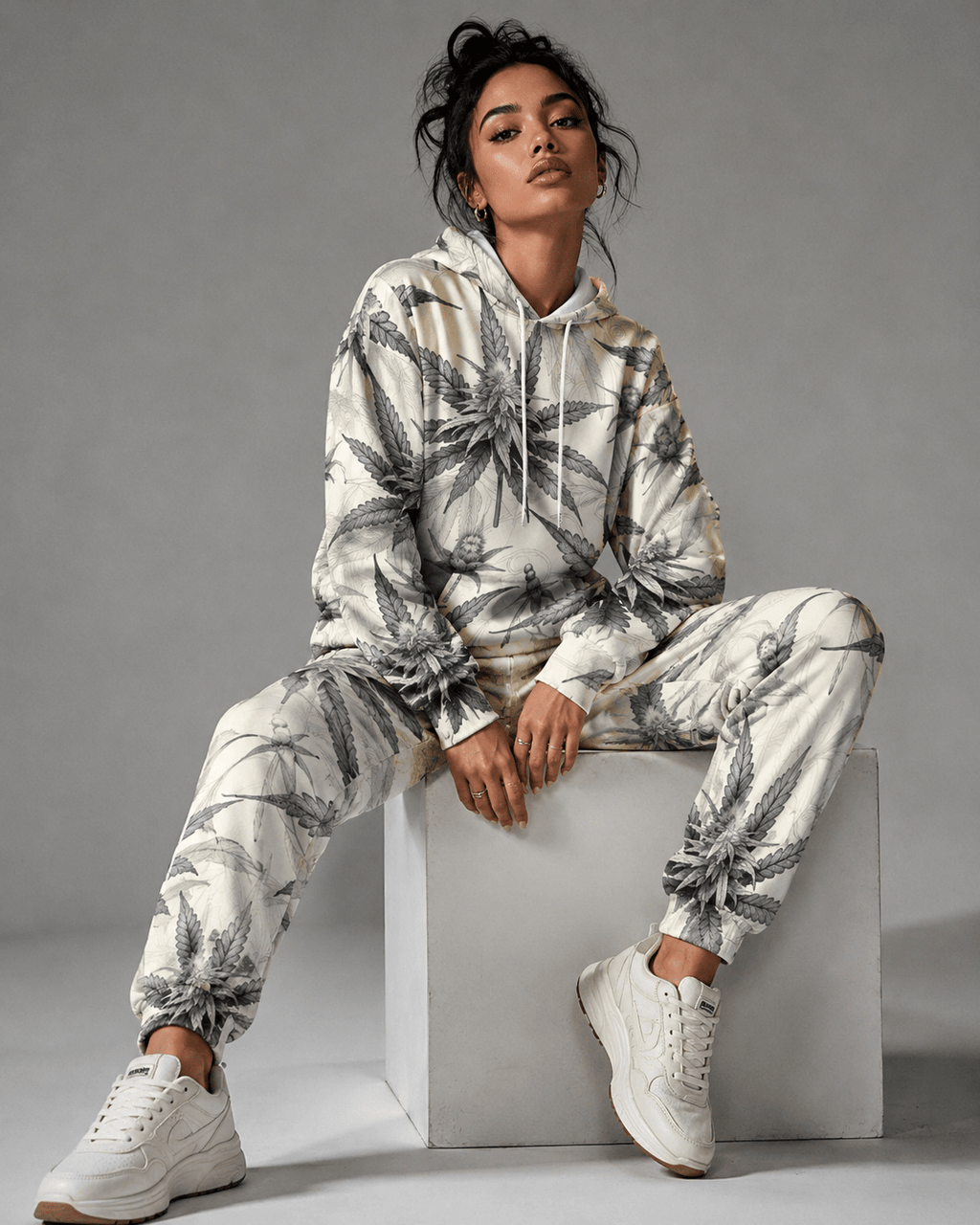 Green leaf print hoodie and sweatpants set, side view on model