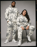 Jane Dope green leaf print hoodie and sweatpants set, lifestyle shot on model