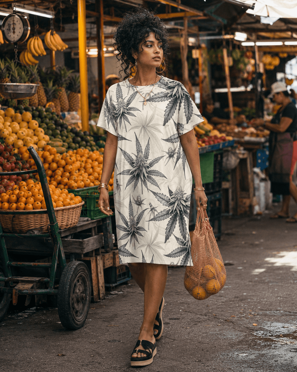 Leaf print t-shirt dress, side view on model
