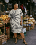 Leaf print t-shirt dress, full length view on model outdoors