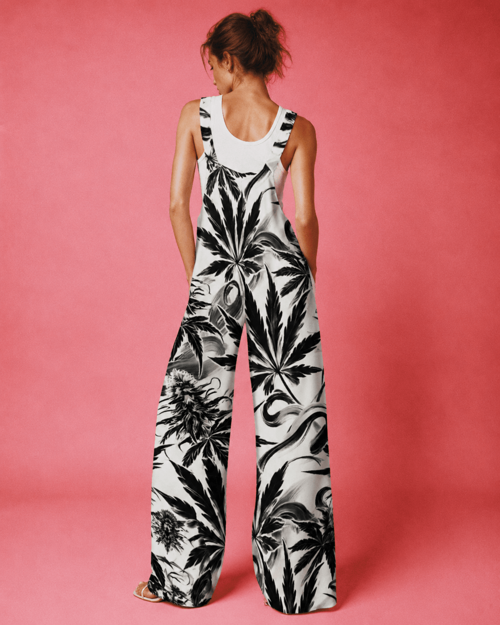 White Widow spider web print jumpsuit, side view on model showing silhouette