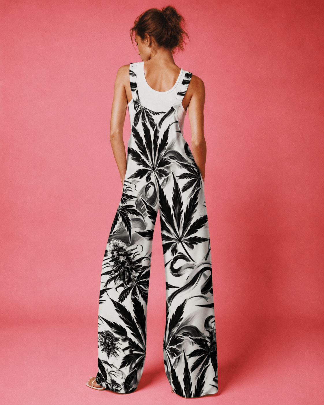 White Widow spider web print jumpsuit, side view on model showing silhouette