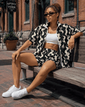 All-over print windbreaker and shorts set, lifestyle editorial shot on model