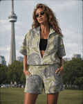 All-over print windbreaker jacket, front view showing zipper and hood detail